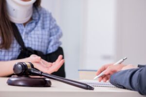 An injured employee consults with a lawyer for insurance advice